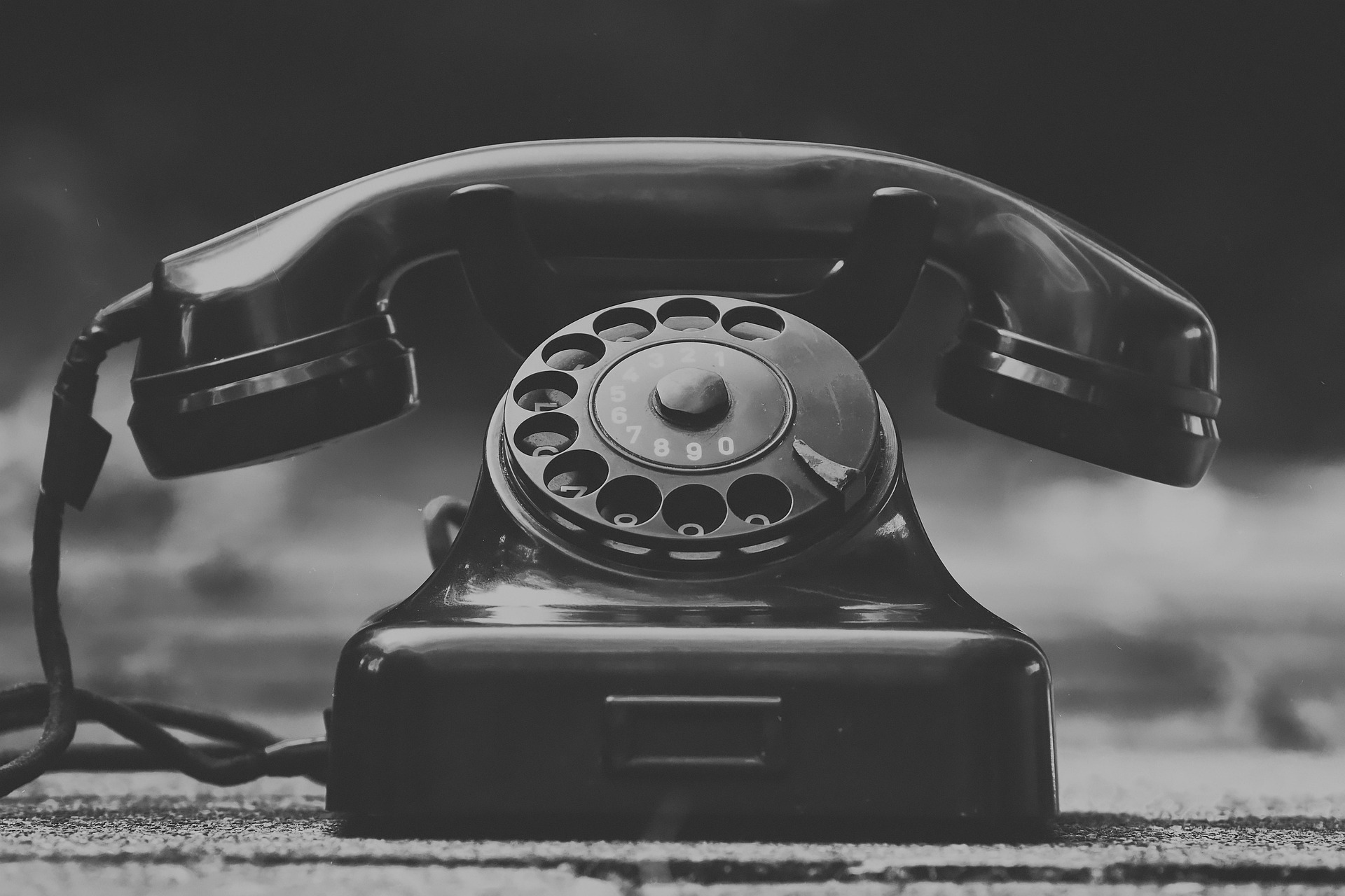 Old fashion black telephoen with rotary dial